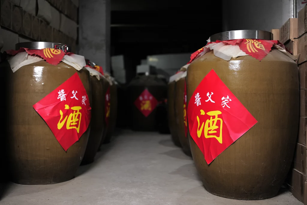 Detail view showing the traditional markings and seals on the storage vessels